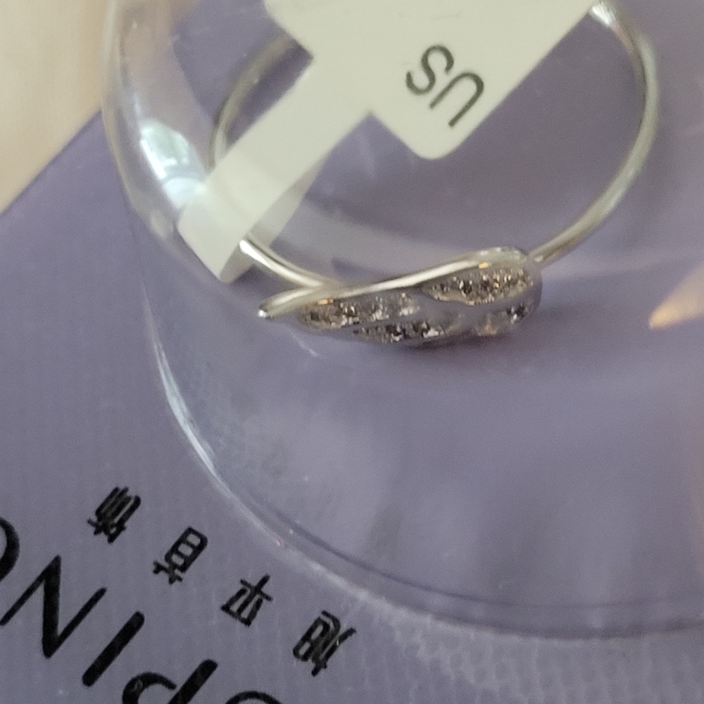 Silvertone ring for sale. Size 9.